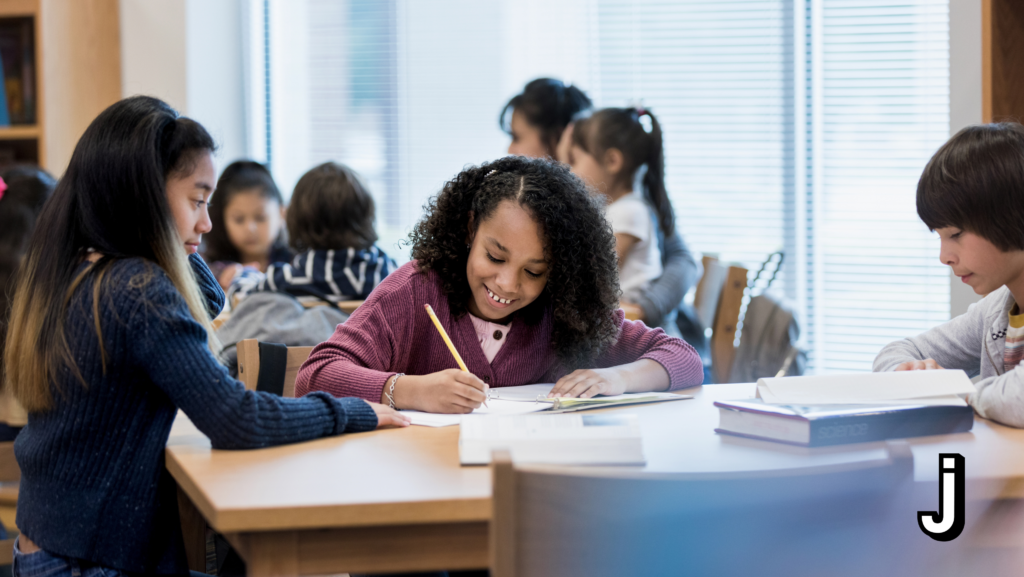 students writing in classroom