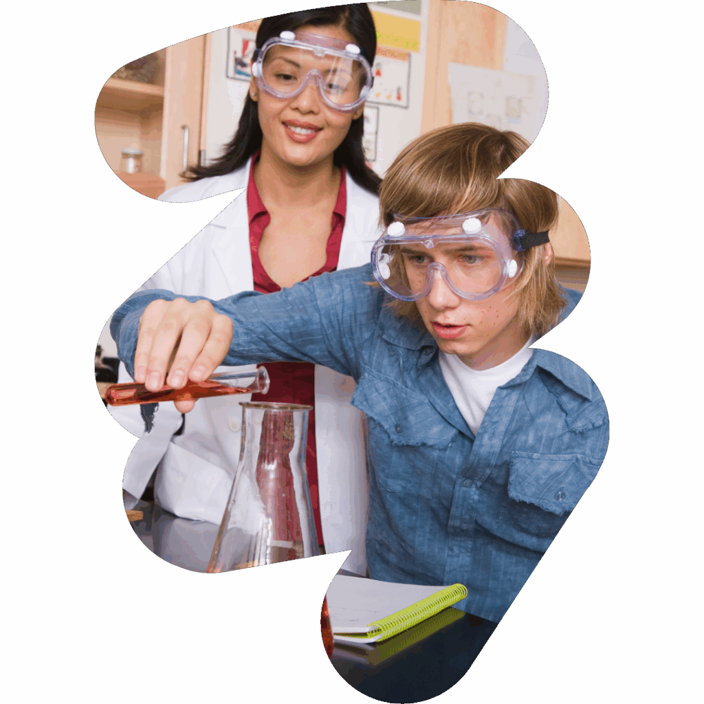 High school students doing an experiment in a science classroom