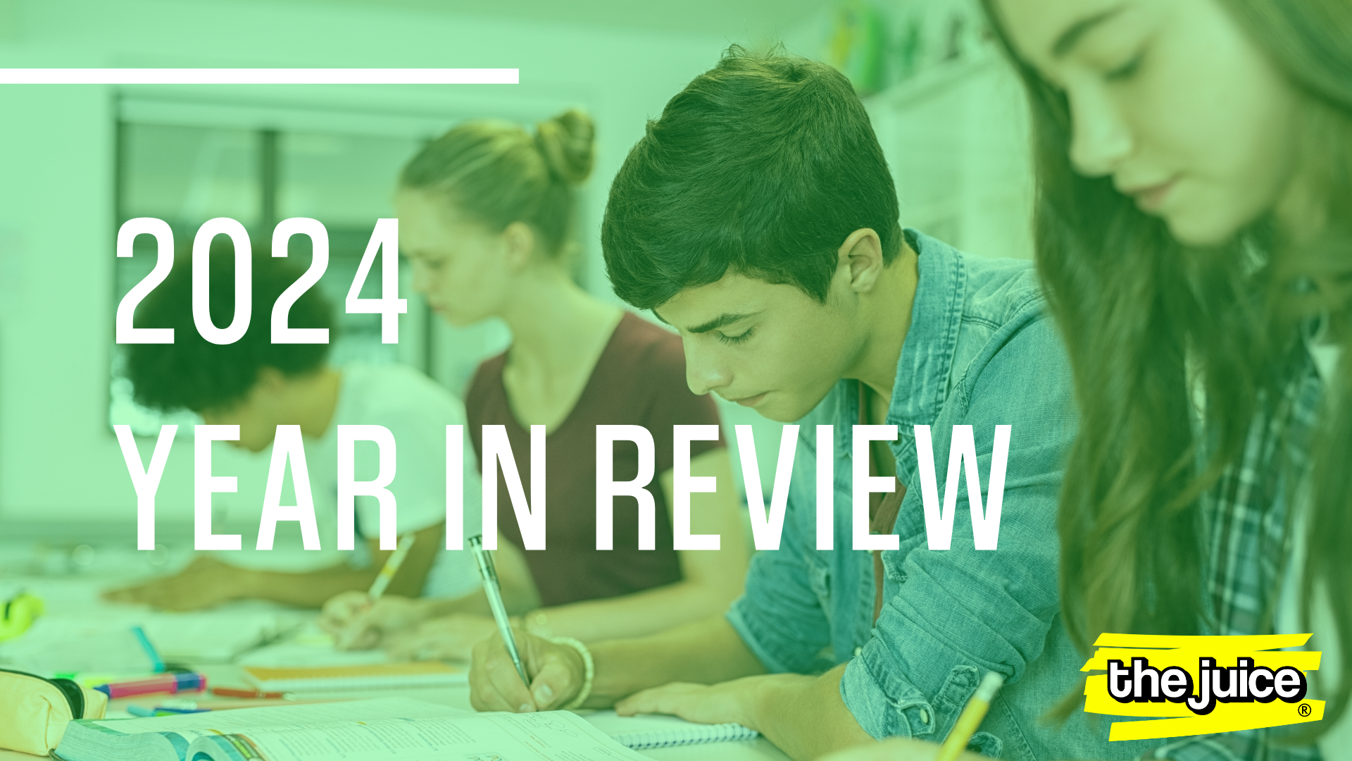 Blog Feature Image 2024 Year in Review with Students writing at their desks in a classroom